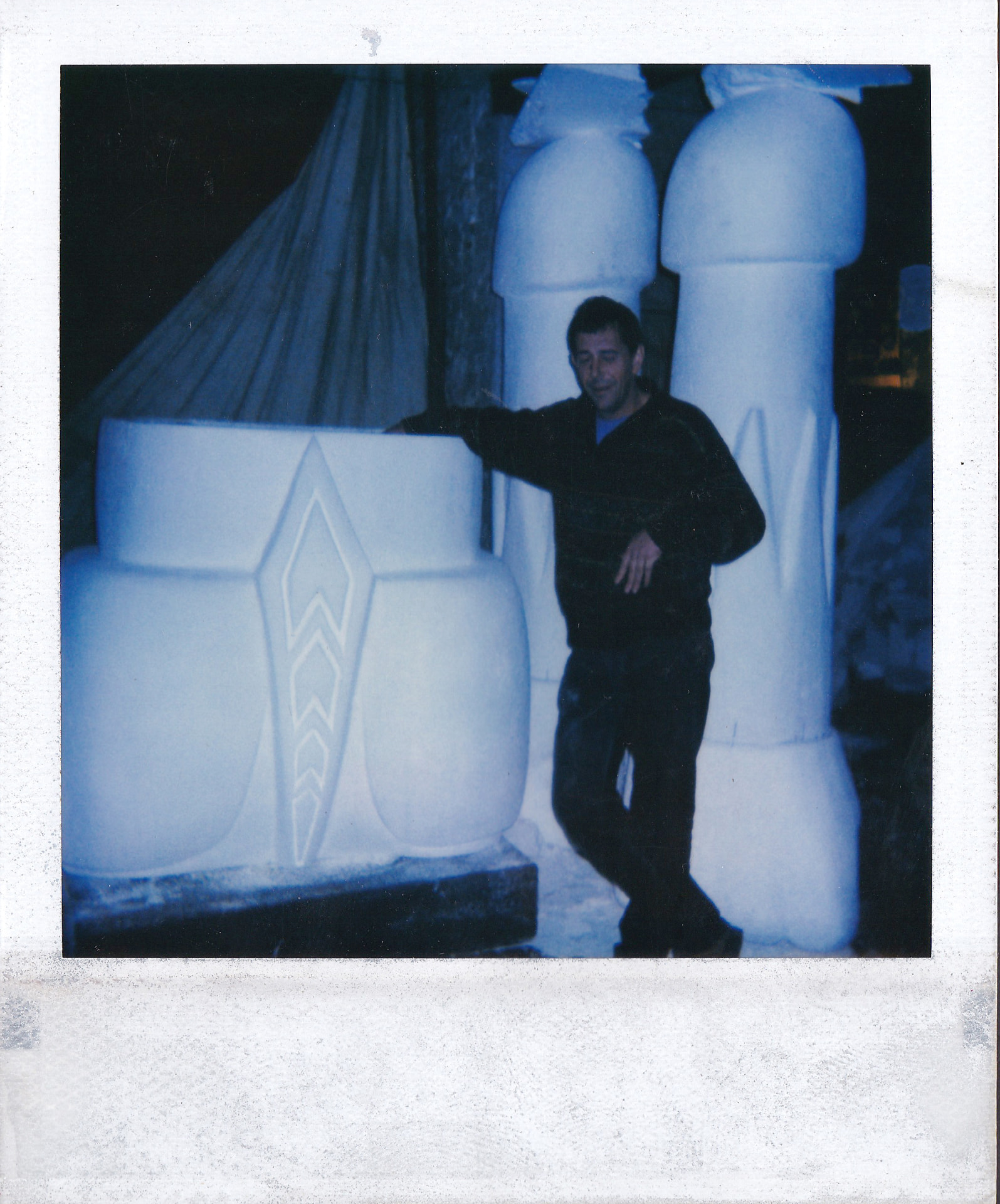 Set designer Pierro Vandermeeren in his workshop, beside the sculpted elements of the Goldorak.