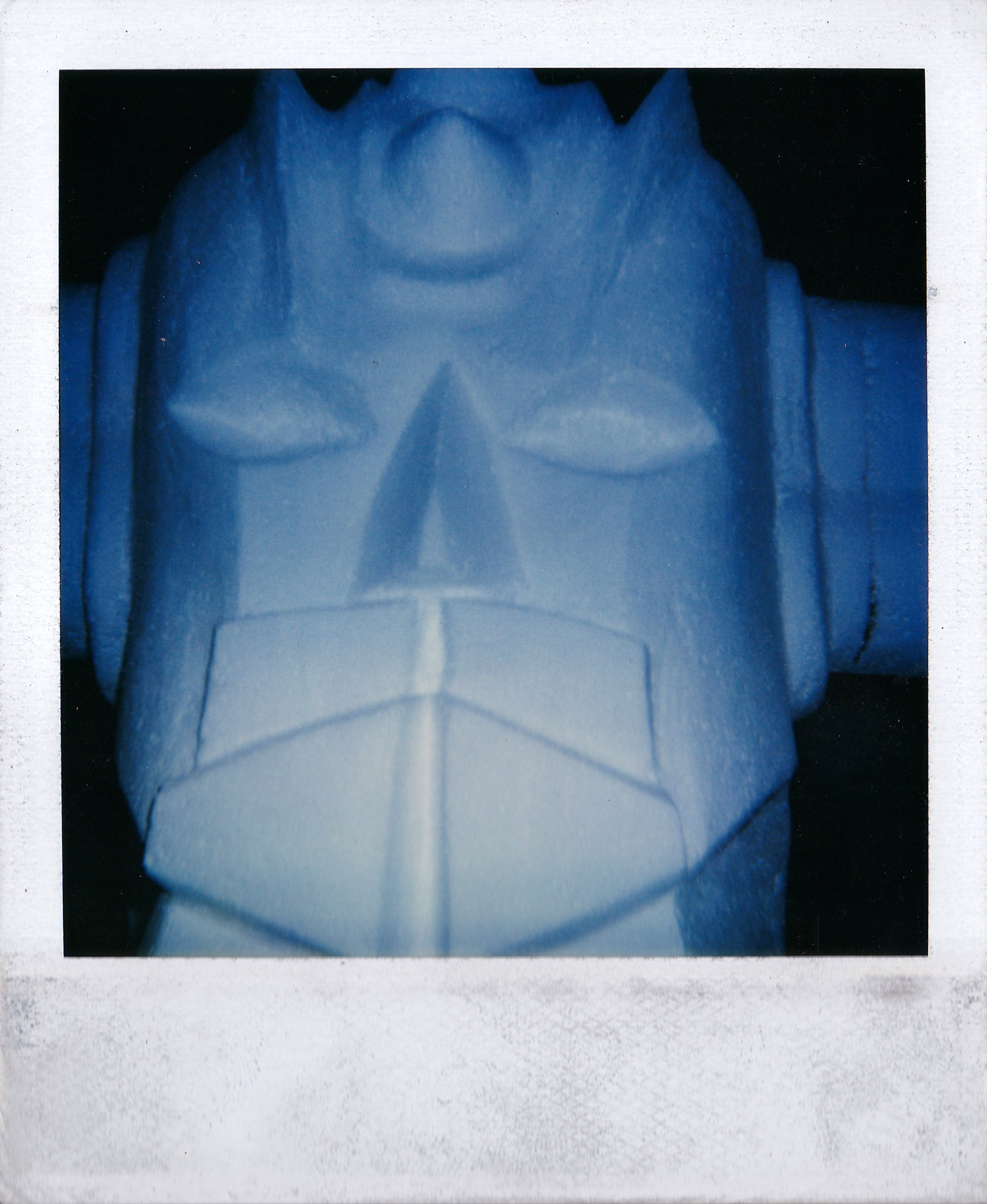 The finished face of the Goldorak, carved and painted before installation in the club.