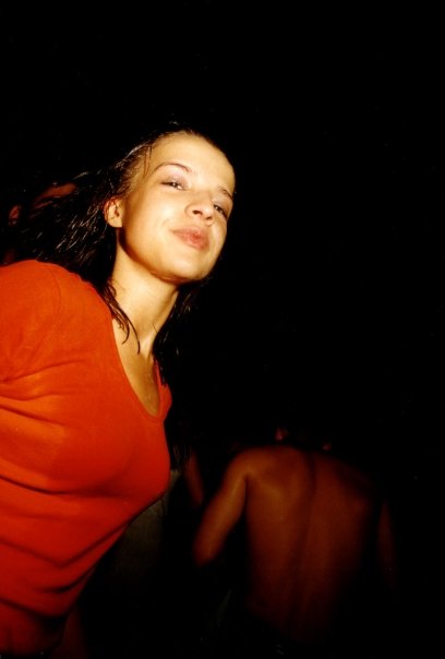 Portrait of a clubber in a red top, after the foam has passed.