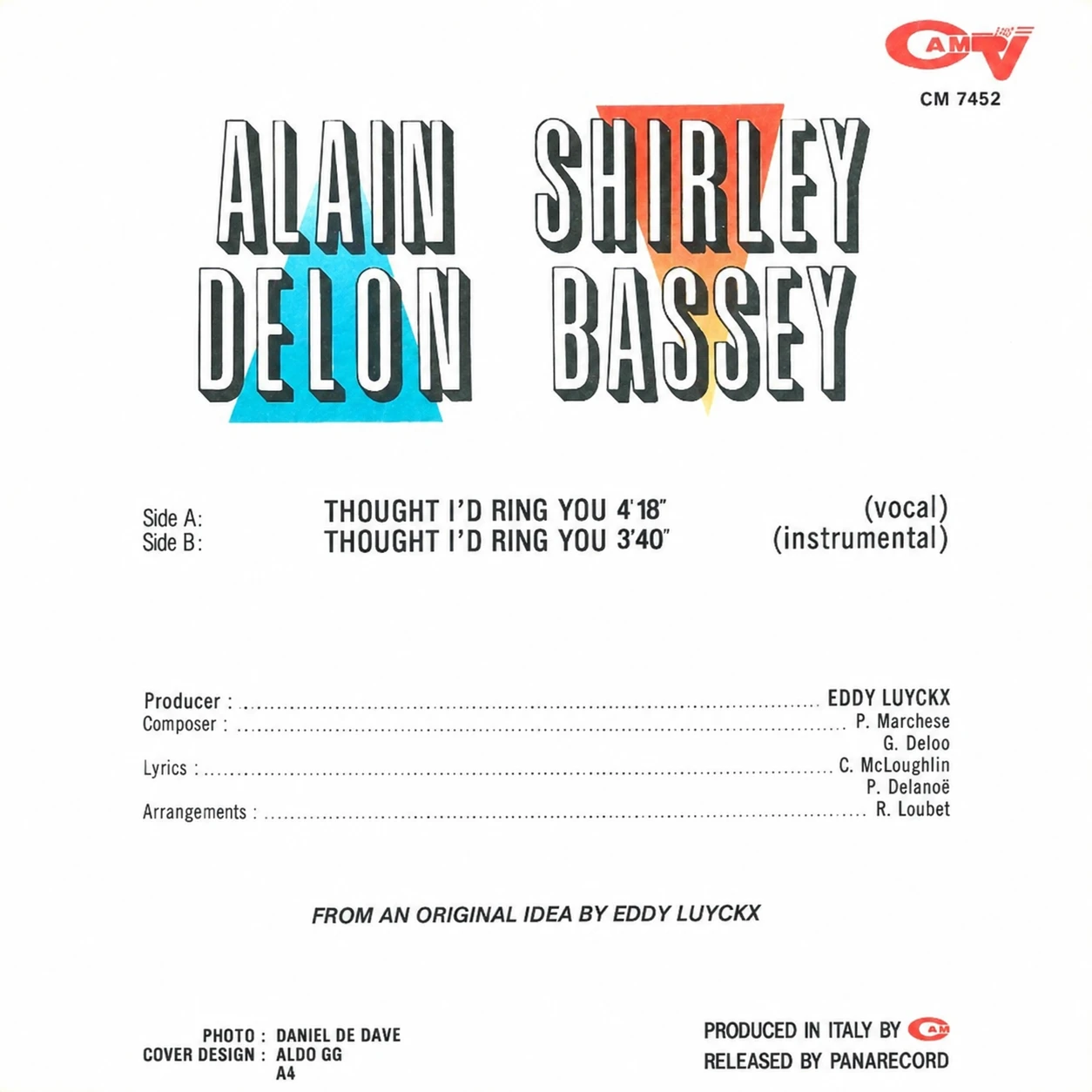 Verso de la pochette : lettrage « Alain Delon » sur triangle bleu et « Shirley Bassey » sur triangle orange, logo CAM et référence CM 7452, liste des faces et crédits imprimés.